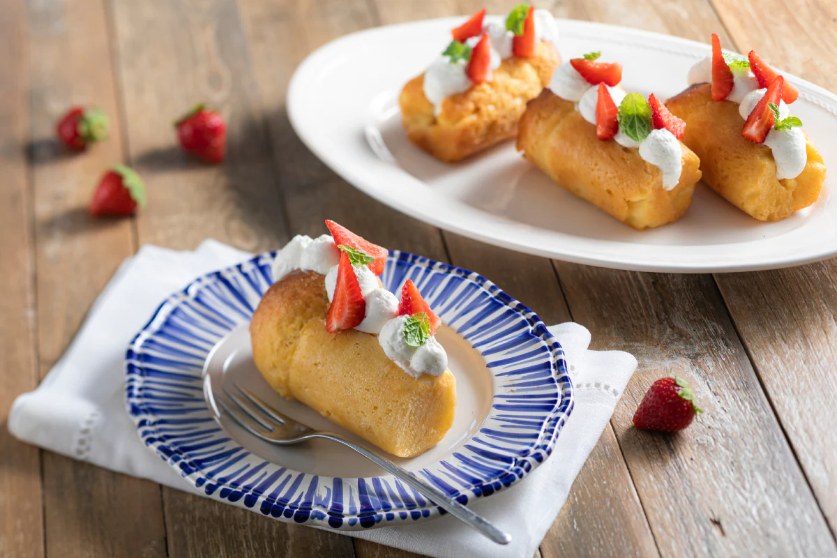 Rum babà (Rum syrup infused sponge cake)