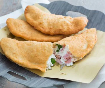 Fried pizza with mortadella and fior di latte cheese