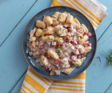 Gnocchi with speck and walnuts