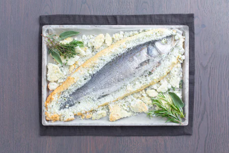 Sea bass in a herb salt crust