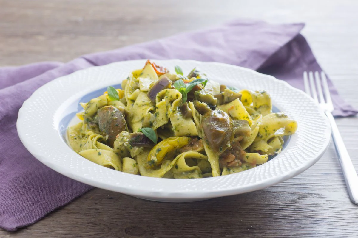 Tagliatelle with eggplant, pesto, and cherry tomatoes