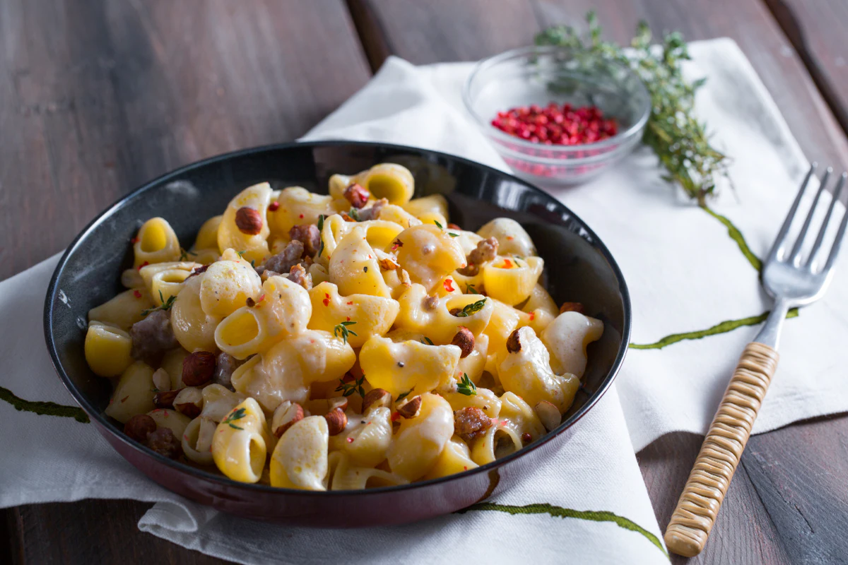 Pasta with sausage and parmigiano cream