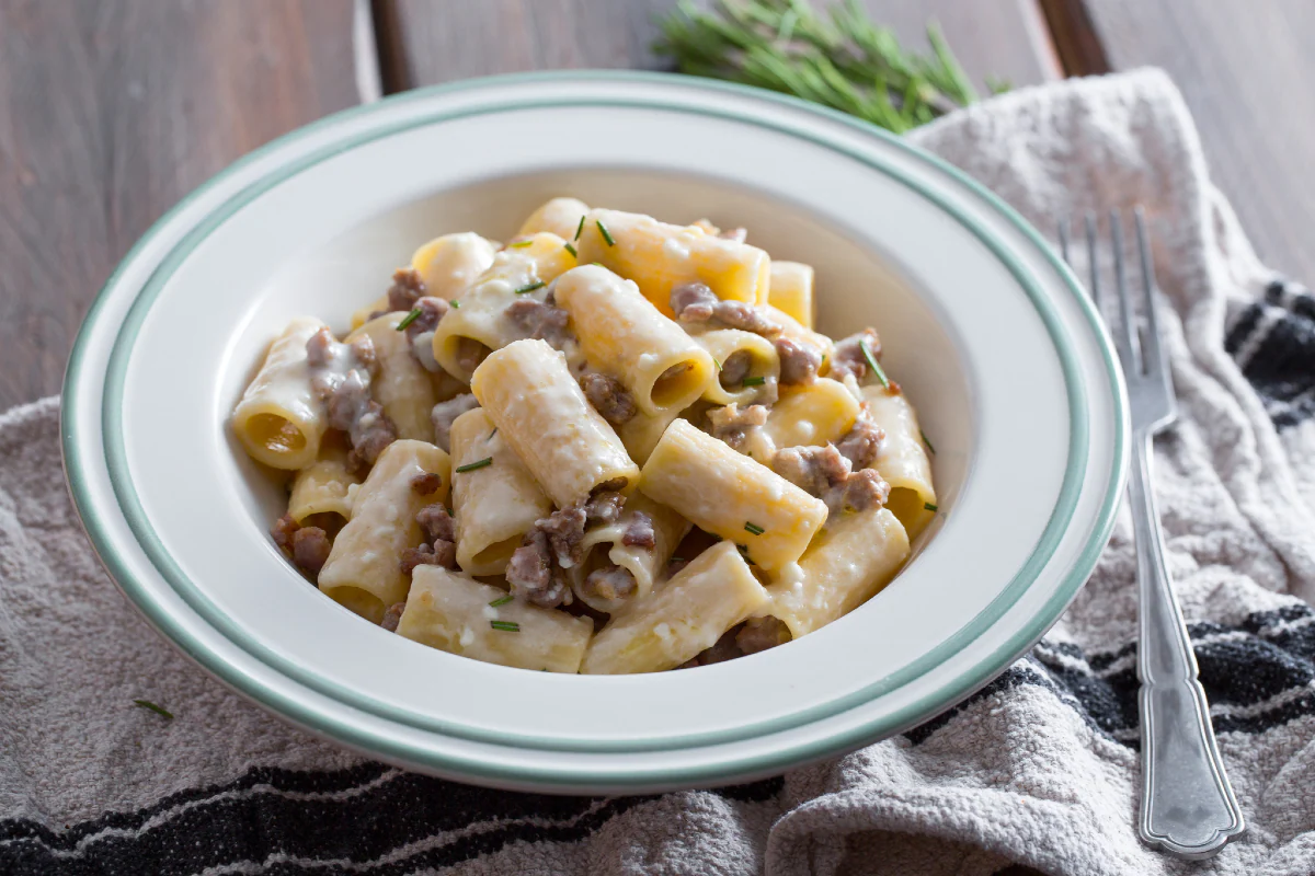 Pasta with sausage and taleggio cheese