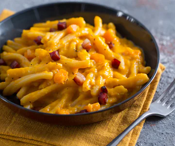 Pasta with butternut squash and speck