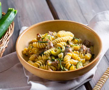 Pasta with sautéed zucchini and salamella sausage