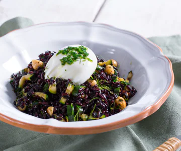 Rice salad with aromatic herbs and soft egg