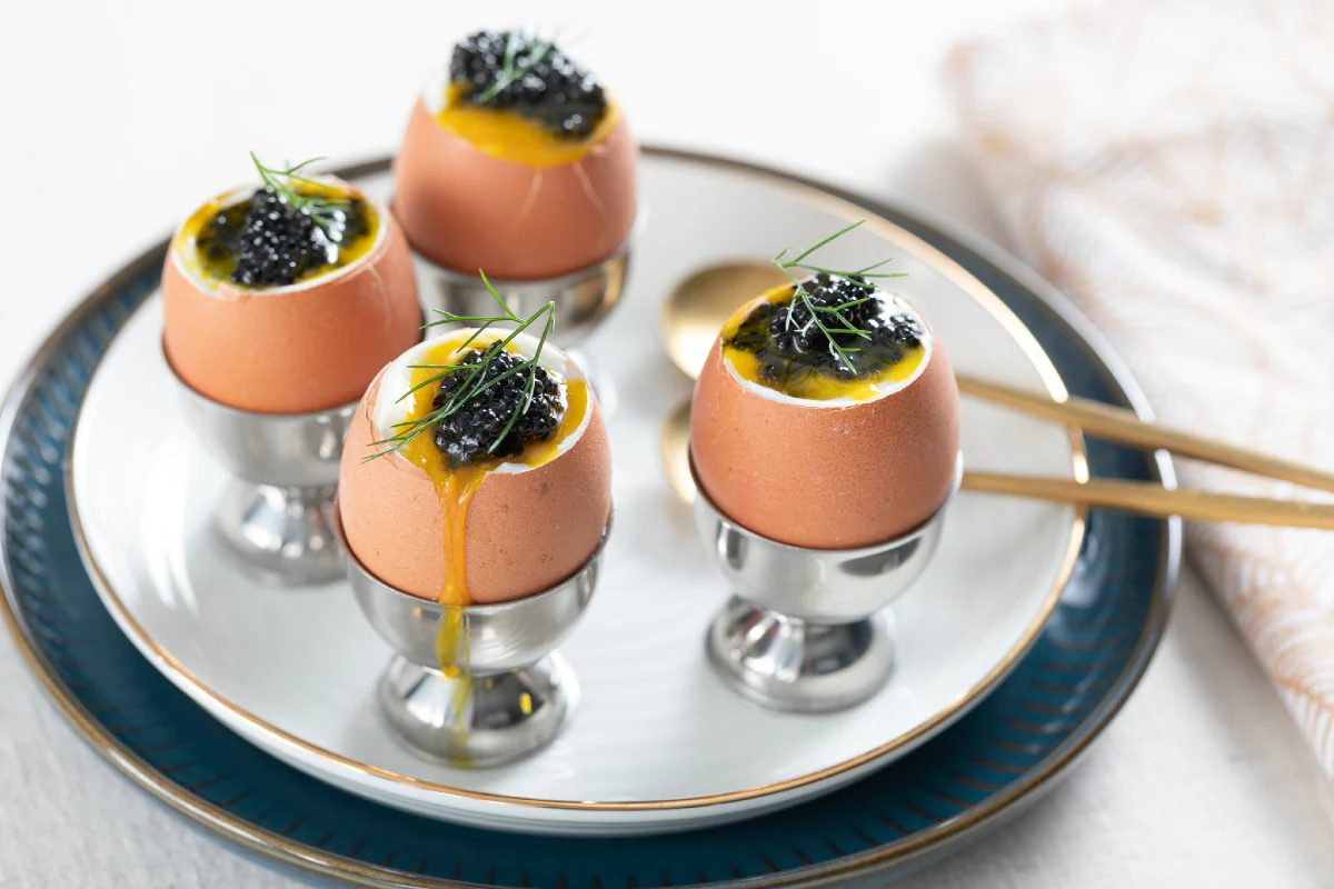 Soft-boiled eggs with caviar