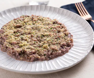 Risotto with radicchio, anchovy butter, and aromatic breadcrumbs