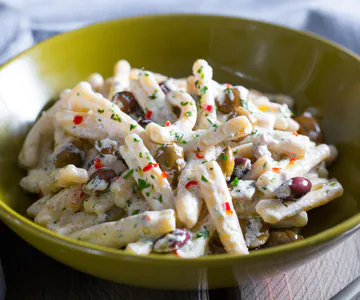 Casarecce with ricotta cream, olives, and anchovies