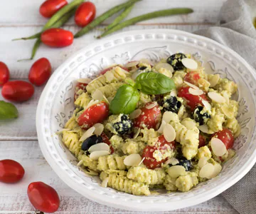 Pasta with Green Bean Pesto, Cherry Tomatoes and Olives