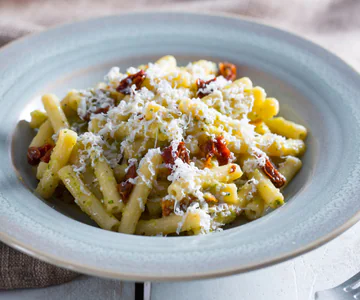 Pasta with Zucchini Pesto, Ricotta, and Sun-Dried Tomatoes