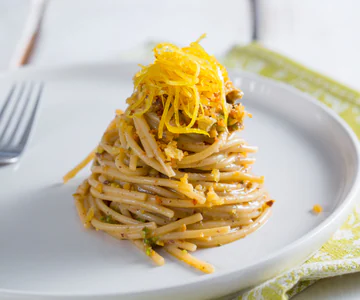 Spaghettoni with Anchovy, Pistachios, and Candied Lemon