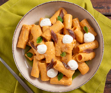 Pasta with Sun-dried Tomato Pesto, Ricotta, and Anchovies