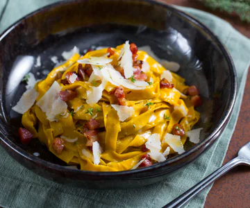 Pumpkin Tagliatelle with Crispy Bacon and Grana Padano