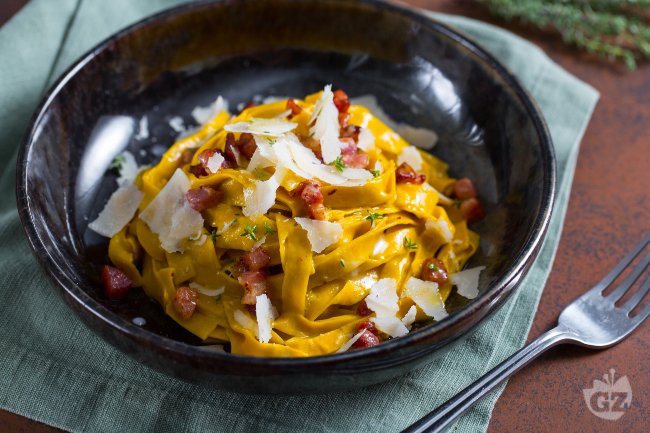 Pumpkin Tagliatelle with Crispy Bacon and Grana Padano - Italian recipes by GialloZafferano
