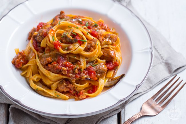 Pasta with Porcini Mushrooms and Sausage - Italian recipes by GialloZafferano