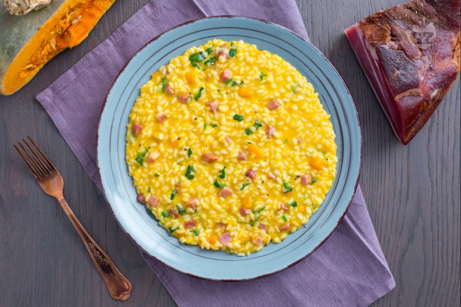 Pumpkin and speck risotto - Italian recipes by GialloZafferano