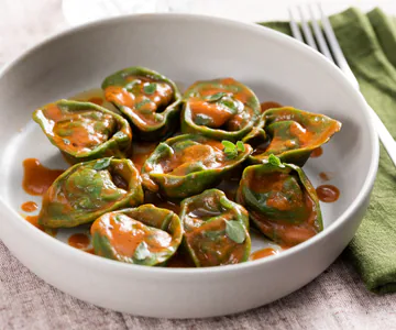 Cappellacci with shrimps and artichokes