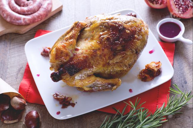 Guinea Fowl Stuffed with Chestnuts and Pomegranate Sauce - Italian recipes by GialloZafferano