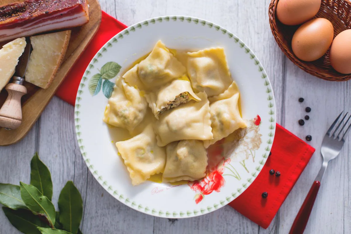 Ravioli with capon broth