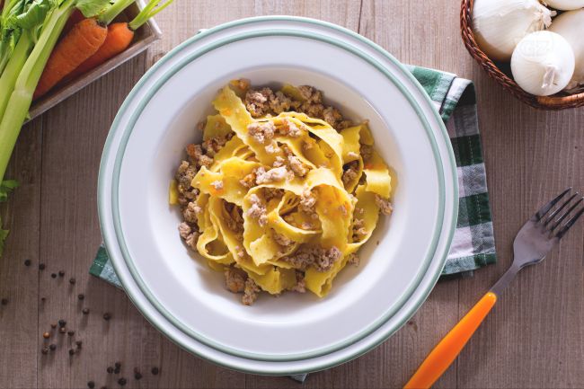 Pappardelle with White Ragù of Cinta Senese - Italian recipes by GialloZafferano