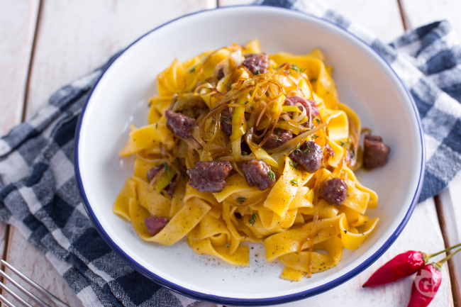 Rustic Pappardelle with Sausage and Leeks - Italian recipes by GialloZafferano