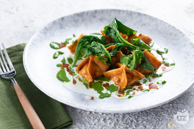 Shrimp ravioli with stracciatella and turnip greens - Italian recipes by GialloZafferano