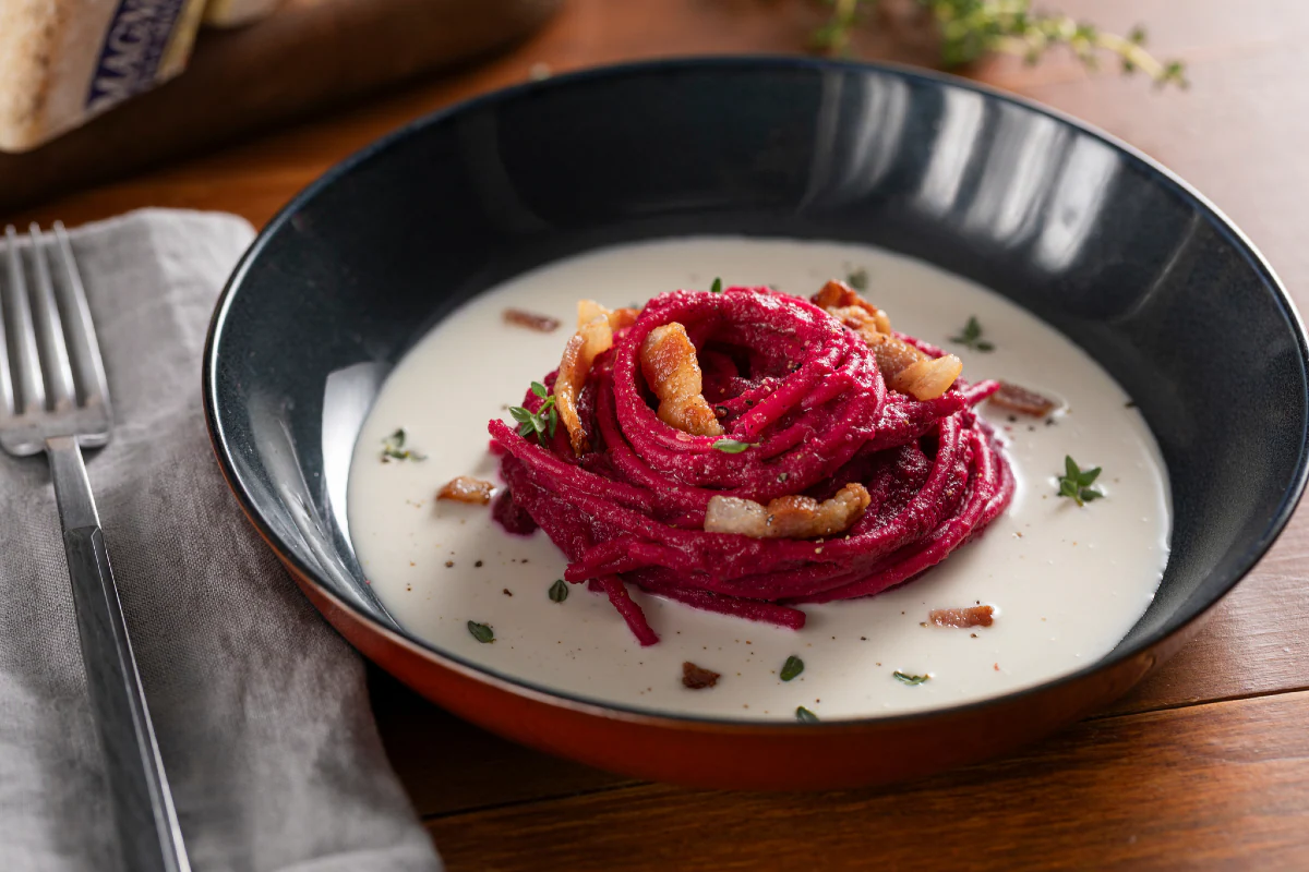 Beetroot Spaghetti, Castelmagno Cream, and Guanciale