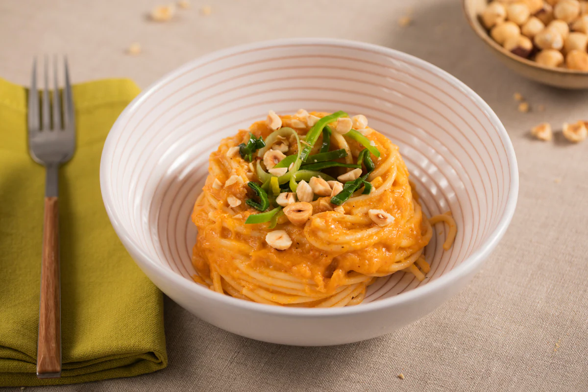 Spaghetti with Leek Cream, Nduja, and Hazelnuts