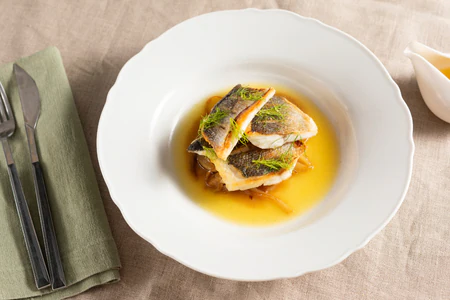 Sea bass fillet with caramelized fennel and orange sauce