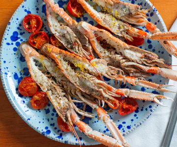 Baked scampi with cherry tomatoes