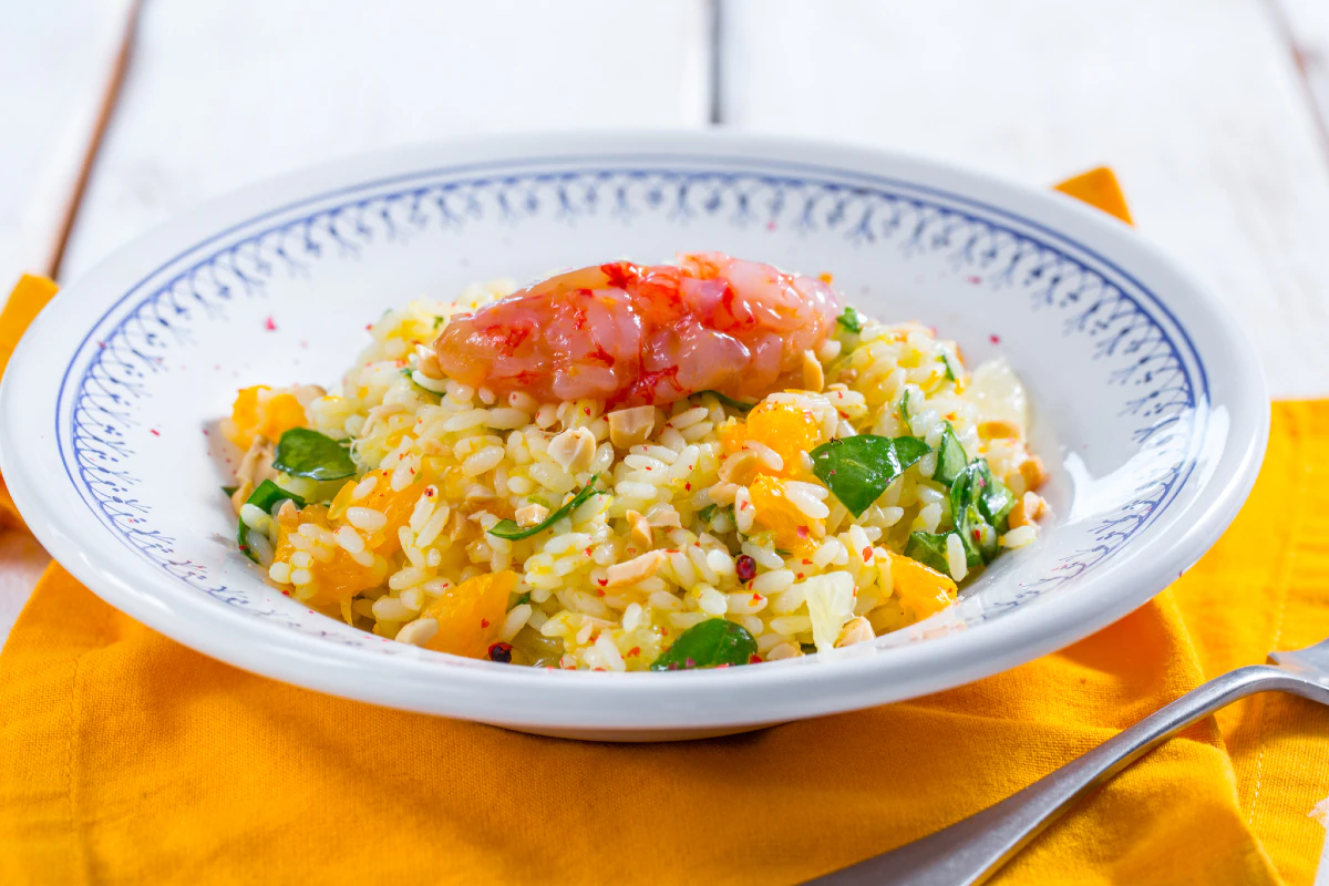 Rice salad with citrus, baby spinach, and shrimp