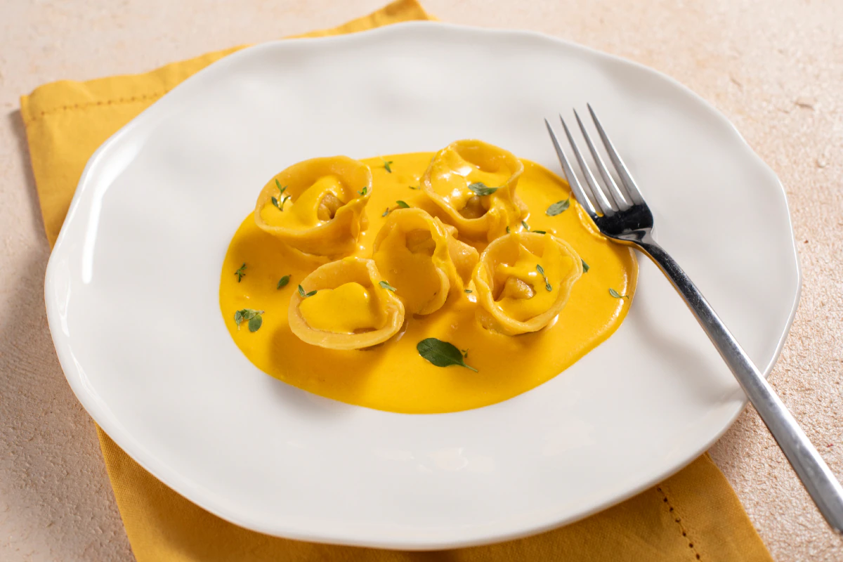 Fish ravioli with saffron sauce