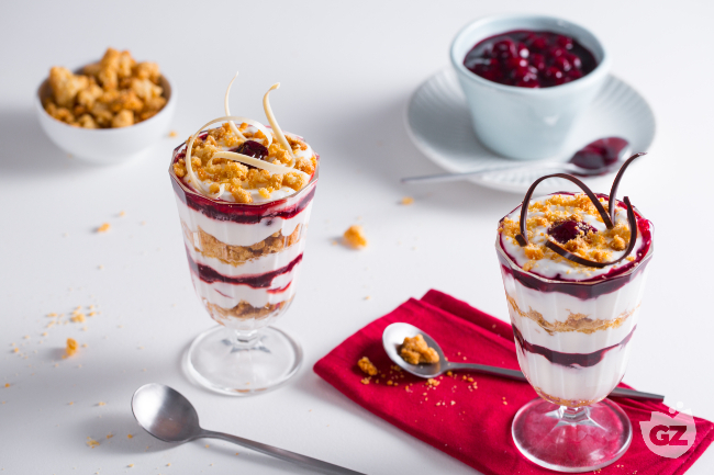 Yogurt mousse with sour cherry gelée and crumble - Italian recipes by GialloZafferano