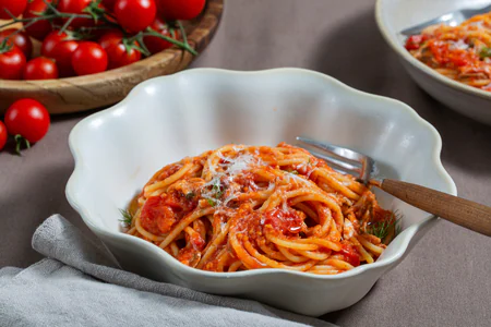 Spaghetti with tomato, anchovies, and pecorino