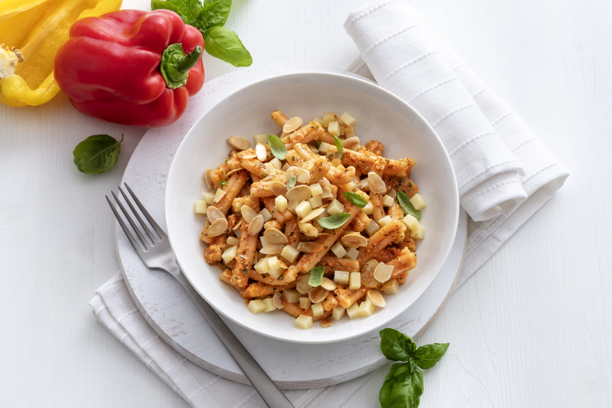 Cold pasta with bell pepper pesto and caciocavallo cheese
