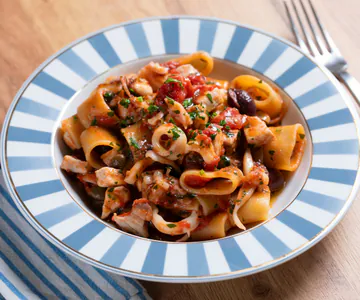 Seafood puttanesca calamarata