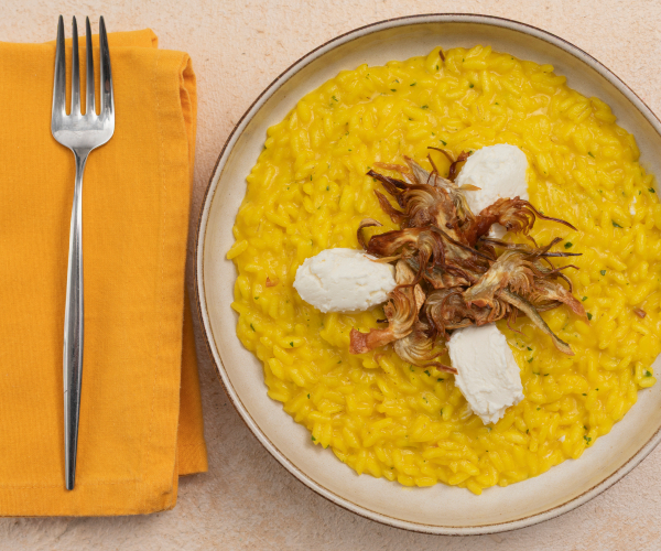 Saffron risotto with artichokes and goat cheese
