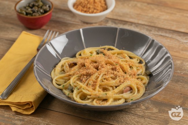 Gluten-free spaghetti with yellow cherry tomato sauce, capers, and anchovies - Italian recipes by Gi
