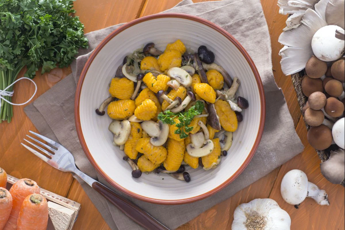 Carrot gnocchetti with mixed mushrooms
