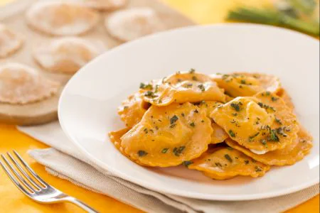 Red ravioli with tomato