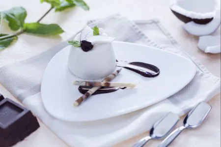 Coconut panna cotta with chocolate sauce