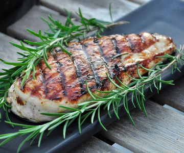 Chicken under a brick