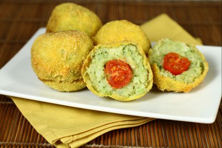 Potato and broccoli croquettes with cherry tomato heart