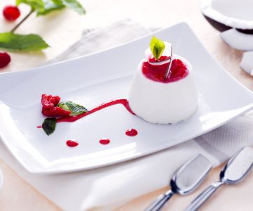 Coconut panna cotta with raspberry coulis