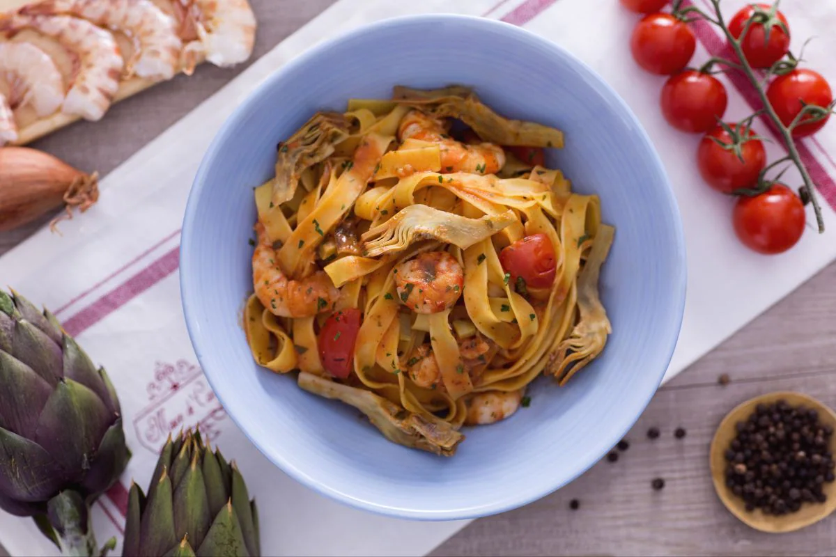 Fettuccine with artichokes and shrimp tails