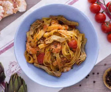Fettuccine with artichokes and shrimp tails