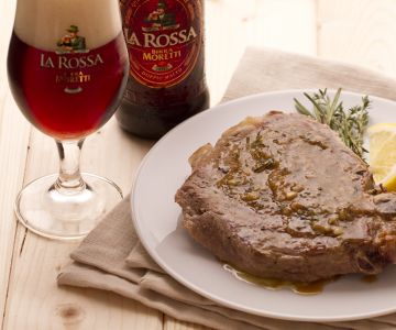 Pork chops with beer and aromatic herbs