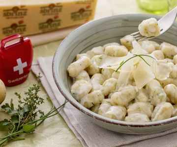 Herb dumplings stuffed with homemade Sbrinz