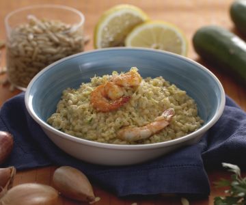Risotto with zucchini pesto, yogurt, and prawns
